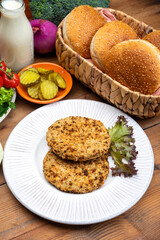 Making vegetarian hamburgers with round patties or burgers made from grains, vegetables and legumes