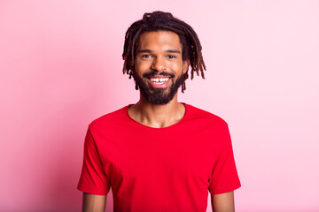 Wall Mural - Photo of young handsome african man happy positive smile wear casual outfit isolated over pink color background