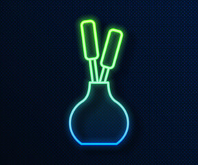 Poster - Glowing neon line Vase icon isolated on blue background. Vector