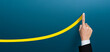 © Worawut - Businessman plan the growth and development, businessman hand drawn a yellow line up