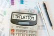 INFLATION word on calculator. Business concept