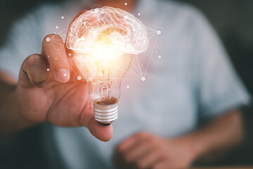 Poster - Idea concept and light bulbs with Brain and connection line, businessman show new ideas with innovative technology and creativity.