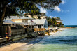 Waterfront homes on the shoreline of Anna Maria Island city overlooking the Gulf of Mexico in Florida
