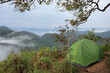 © Phongsak - Camping tent on the hill of mountain forest at 'LerGuaDa' or 'Ler Gwa Dor' Tak province, Thailand, Asia.