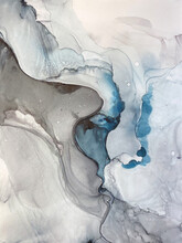 Abstract Blue Fluid Art — Grey-blue Background With Beautiful Smudges And Stains Made With Alcohol Inks. Fragment Of Art With Smokey Texture Resembles Watercolor Or Aquarelle Painting.
