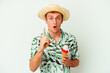 © Asier - Young caucasian man wearing a summer clothes and holding a ice cream isolated on white background