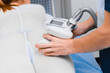 © salomonus_ - Vacuum roller anti-cellulite body massage close up.
