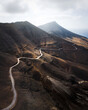 © AmazingAerialAgency - Aerial view of a scenic road driving across the mountain near Cofete, Fuerteventura island, Canary islands, Spain.