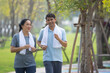 © Suriyo - Asian middle aged couple jogging, Asian man women running jogging exercise in city park on morning