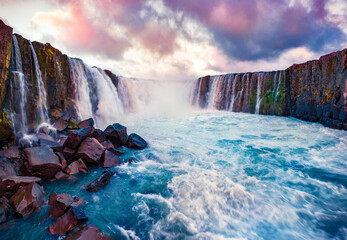 Wall Mural - Beautiful Nordic scenery. Fantastic morning view from the down of canyon of Selfoss Waterfall. Picturesque summer scene of Jokulsa a Fjollum river, Jokulsargljufur National Park, Iceland, Europe