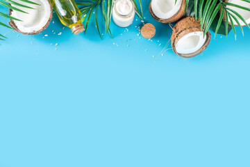 Wall Mural - Coconut oil with fresh coconuts