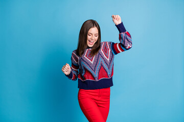 Sticker - Portrait of attractive glad cheerful brown-haired girl dancing having fun isolated over vibrant blue color background