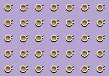 A Pattern With Mugs Filled With Coffee And Milk On A Lilac Background.