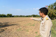 © ULTRAPOK - A Thai government official works outside the office, to explore the farming areas of the villagers.