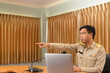 © ULTRAPOK - A Thai government officer, Civil servant getting angry and pointing at someone  at the meeting room in the office.