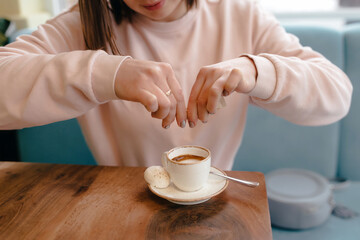 Wall Mural - Process of sweetening coffee with sugar