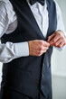 © Дмитрий Ткачук - Young male businessman is dressing a stylish suit for an important meeting. Clothing for an adult man