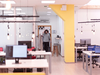 Wall Mural - creative business people group as freelancers in modern coworking open space office