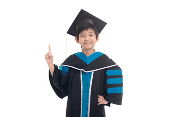 Asian boy student wearing graduation gown pointing finger up on white background isolated