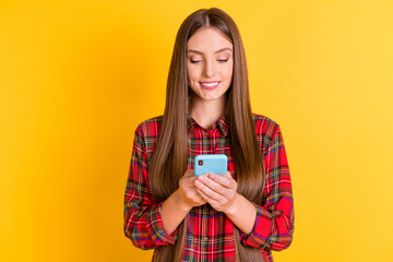 Poster - Portrait of nice brunette long hairdo lady look telephone wear red shirt isolated on vivid yellow color background