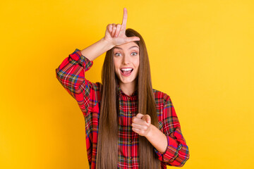 Poster - Portrait of nice brunette long hairdo lady point to camera show loser wear red shirt isolated on vivid yellow color background