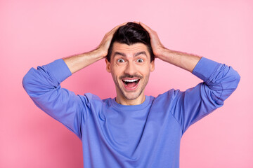 Wall Mural - Portrait of impressed cheerful person arms on head open mouth isolated on pastel pink color background