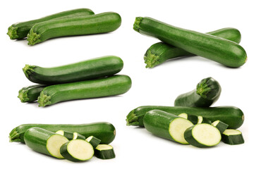 Wall Mural - Some whole and some cut zucchini (Cucurbita pepo) on a white background