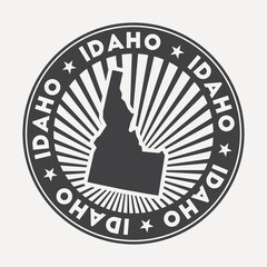 Wall Mural - Idaho round logo. Vintage travel badge with the circular name and map of us state, vector illustration. Can be used as insignia, logotype, label, sticker or badge of the Idaho.