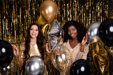 Poster - Photo of two brown haired ladies festive mood balloons smile party dress isolated on shine bright tinsel background