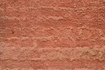 Wall Mural - Red-orange painted wall with cinder block texture. Abstract interior background.