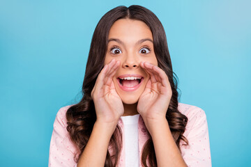 Wall Mural - Photo of curly hairstyle pupil hands around open mouth scream dotted clothing isolated on blue color background