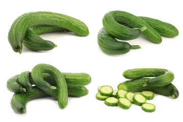 Wall Mural - bunch of curly turkish cucumbers and some cut pieces on a white background