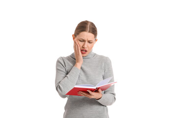 Wall Mural - Surprised woman with book on white background