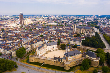 View from drone of old and modern houses of Nantes town at summer day, France