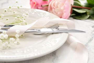 Beautiful table setting on white background, closeup