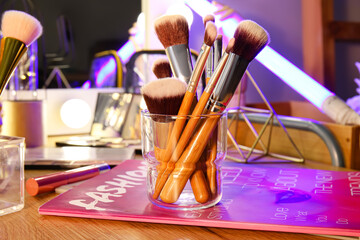 Poster - Set of makeup brushes on dressing table