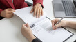 © Puwasit Inyavileart - Sign a document, Signing of employment contract documents, Applicants are legally selected to work in the company, Employment and selection of new staff representatives concept.