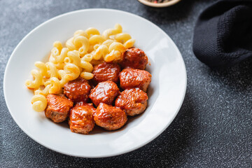 pasta meatballs tomato sauce plate pork beef lamb chicken meat second course portion on the table healthy meal top view copy space rustic food background 