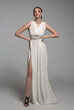 © Alena - Fashion woman portrait in white long flying airy dress