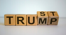 Wooden Cubes And Changes The Word 'Trump' To 'Trust'.