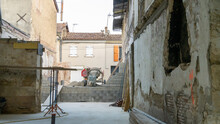 Site Between Two Townhouses, View Of The Concrete Mixer