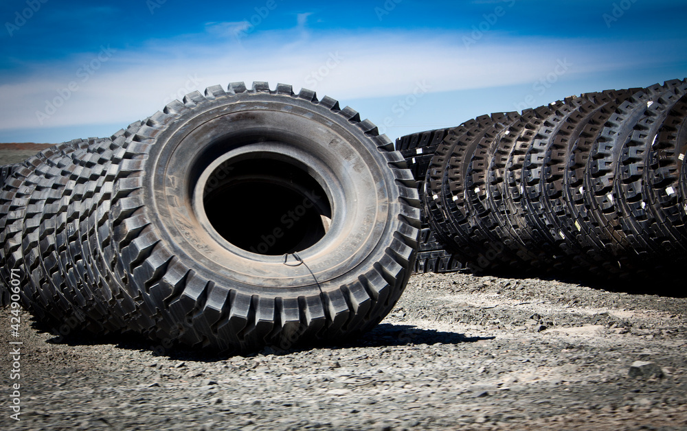 Rows of huge tyres used for large-scale mining vehicles. Queensland Australia
