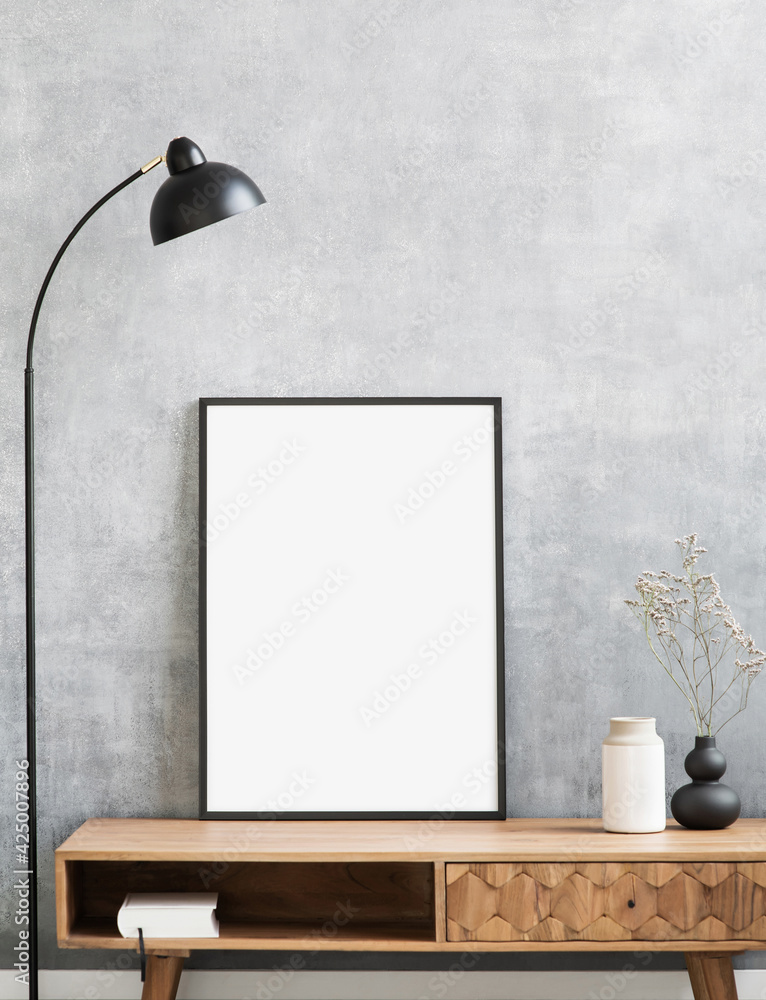 Obraz na płótnie Blank picture frame mockup on gray wall. Living room design. View of modern style interior. Home staging and minimalism concept. Artwork poster showcase. w salonie