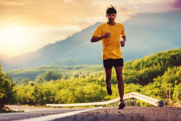 Wall Mural - Athlete runner feet running on road, Jogging concept at outdoors. Man running for exercise.