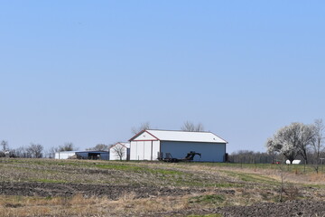 Wall Mural - White Metal Barn in a Field