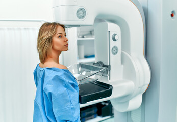 In the hospital, the patient undergoes a screening procedure for a mammogram, which is performed by a mammogram. A modern technologically advanced clinic with professional doctors.