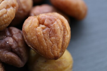 peeled chestnuts close-up. rosted organic chestnuts. healthy snack. Seeds and nuts. Healthy fats.