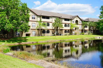 Wall Mural - A beautiful Florida community pond 