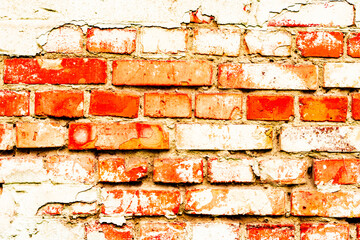 Texture of a brick wall with cracks and scratches which can be used as a background