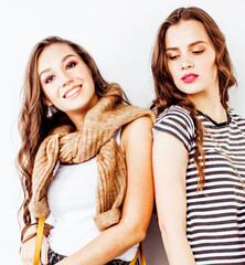 two best friends teenage girls together having fun, posing emotional on white background, besties happy smiling, making selfie, lifestyle people concept